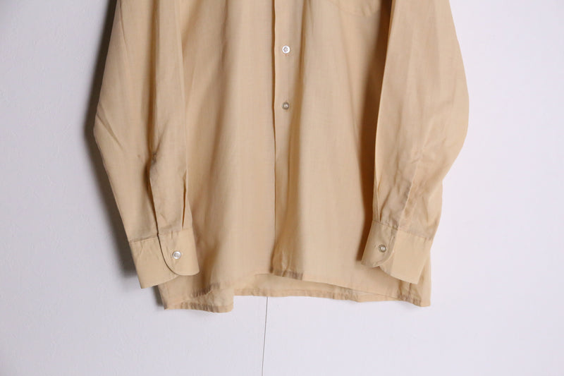 70's light yellow poly shirts