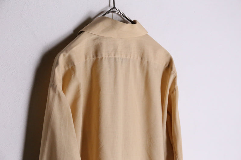 70's light yellow poly shirts