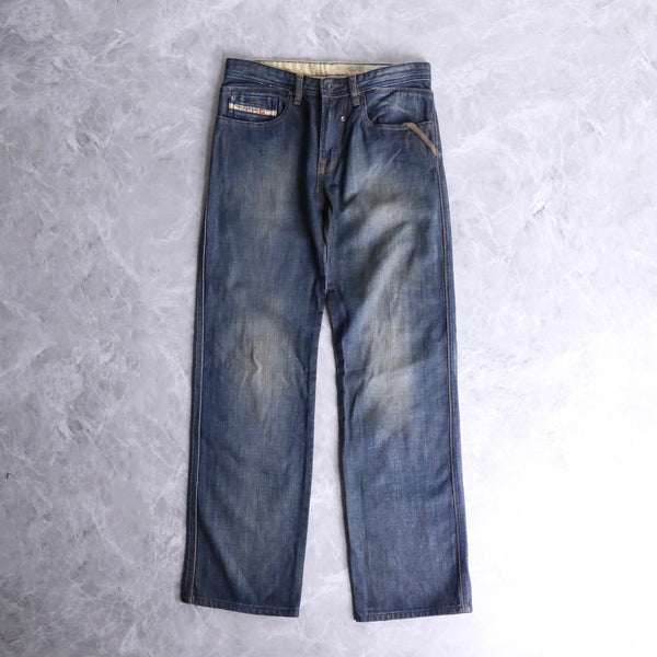 “DIESEL KID”preslim tapered denim