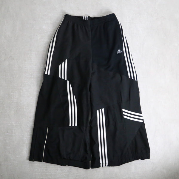 "Re:make" asymmetry docking HAKAMA track pants