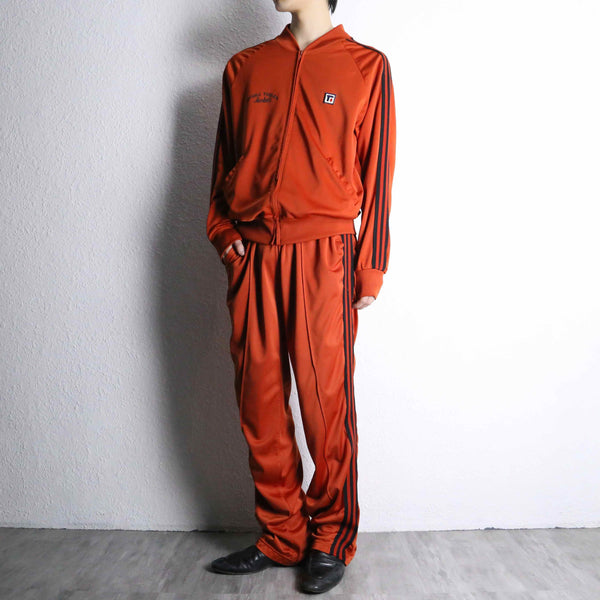orange color track jacket set up