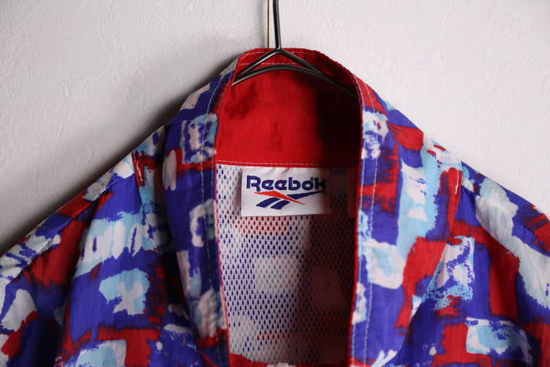 90's "Reebok" multicolored switching nylon track jacket