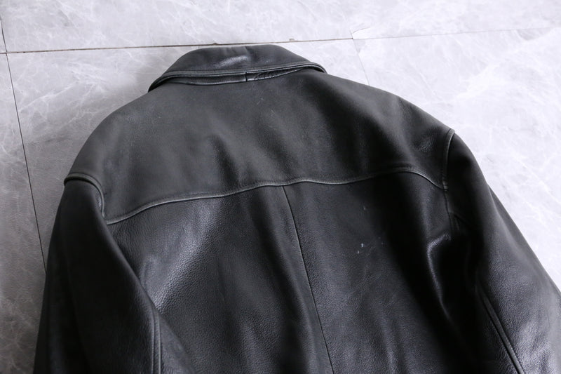 black leather middle length jacket