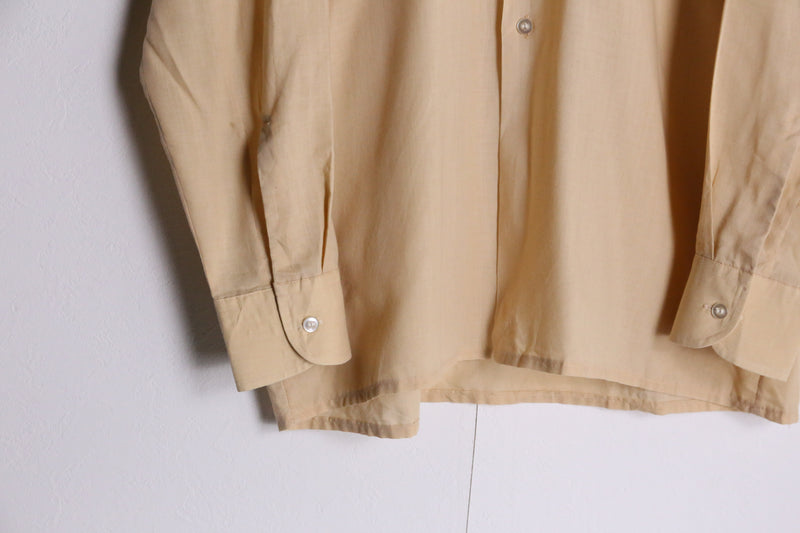 70's light yellow poly shirts