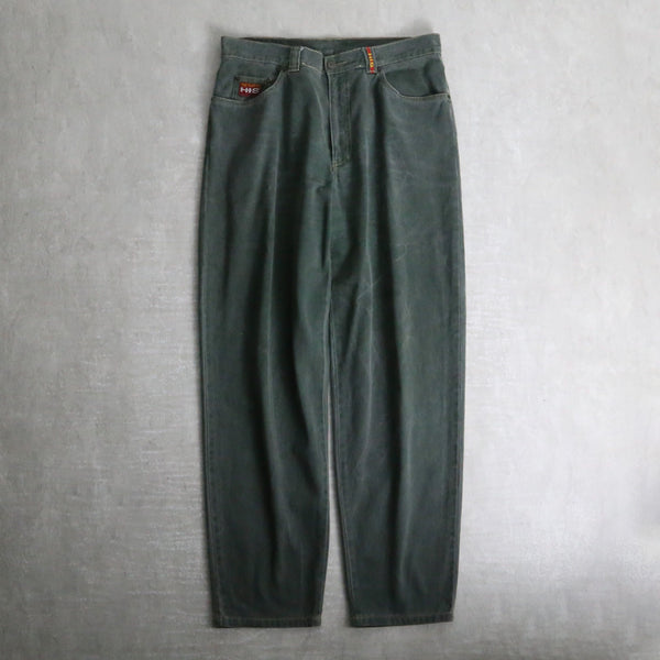 fade green wide tapered silhouette denim