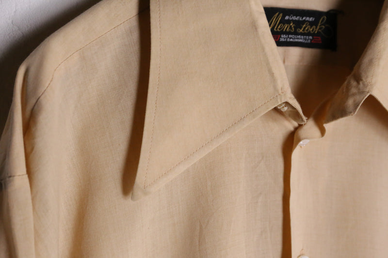 70's light yellow poly shirts