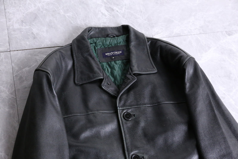 black leather middle length jacket