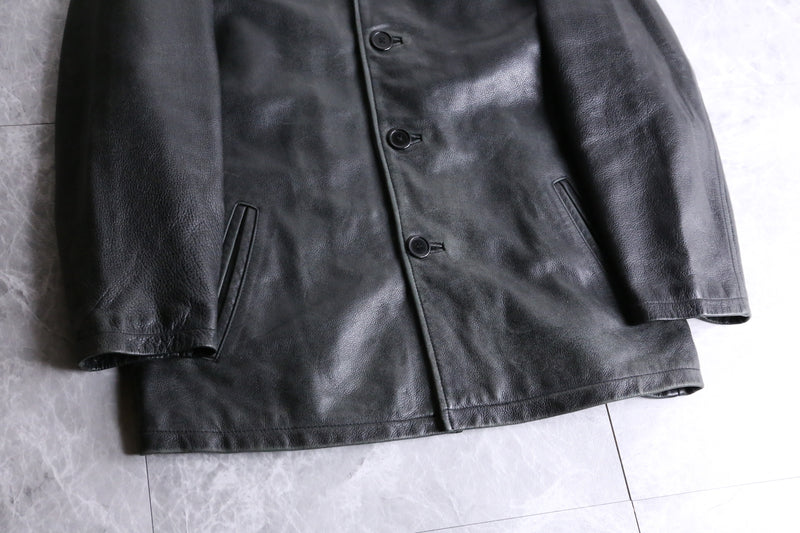 black leather middle length jacket