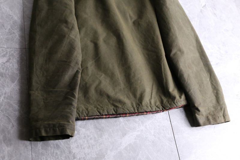 khaki short length oiled jacket