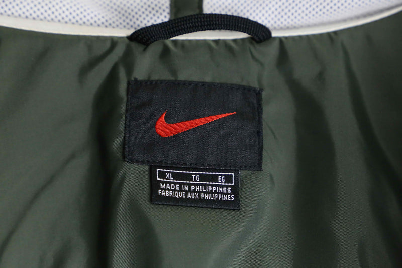 "NIKE" fishtale silhouette over nylon jacket