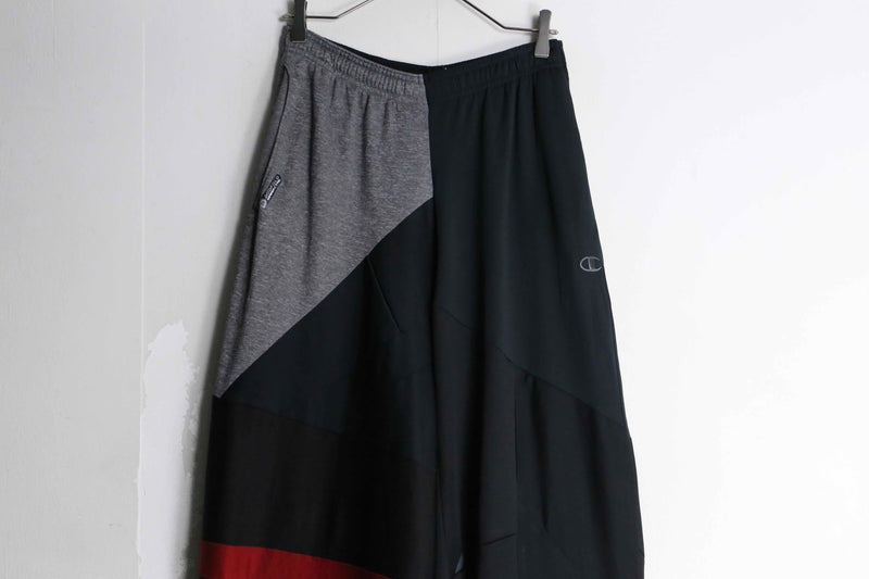 "Re:make" asymmetry patchwork HAKAMA track pants