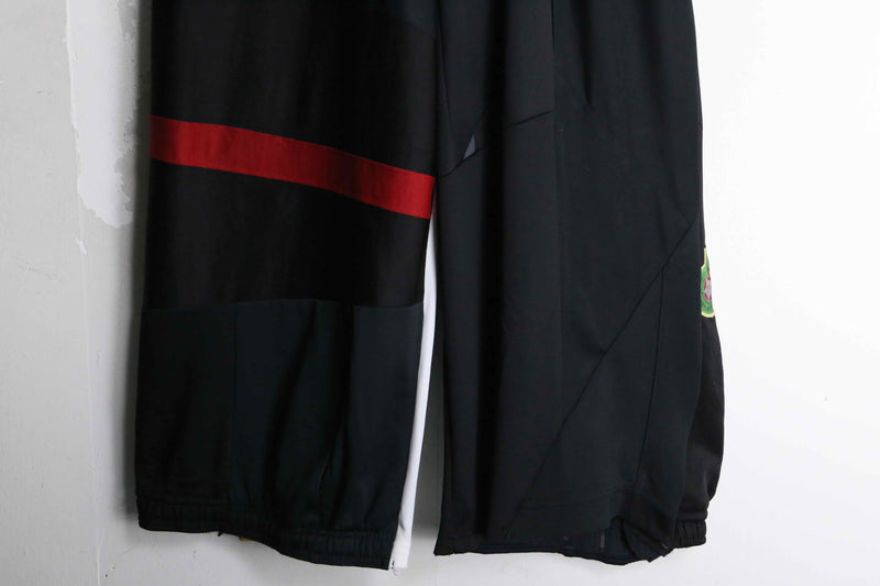 "Re:make" asymmetry patchwork HAKAMA track pants