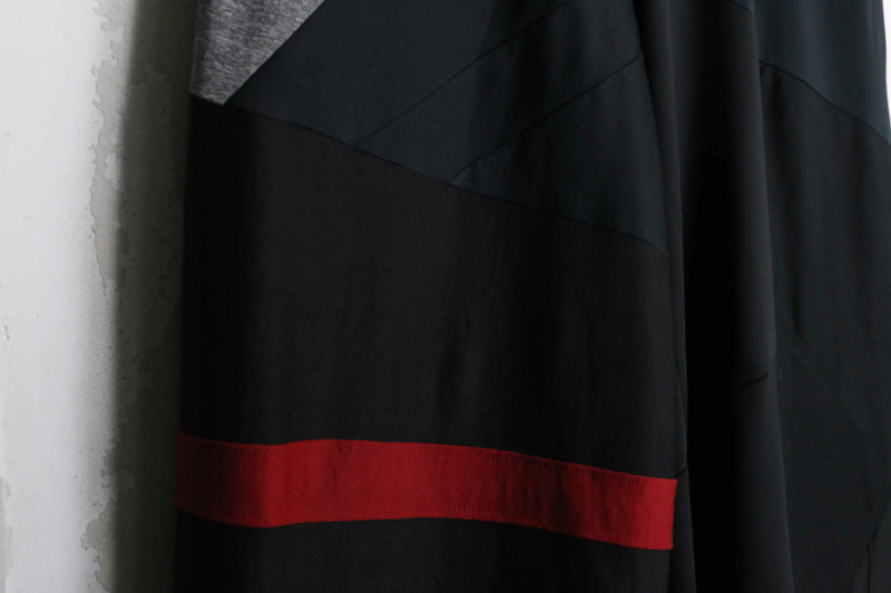 "Re:make" asymmetry patchwork HAKAMA track pants