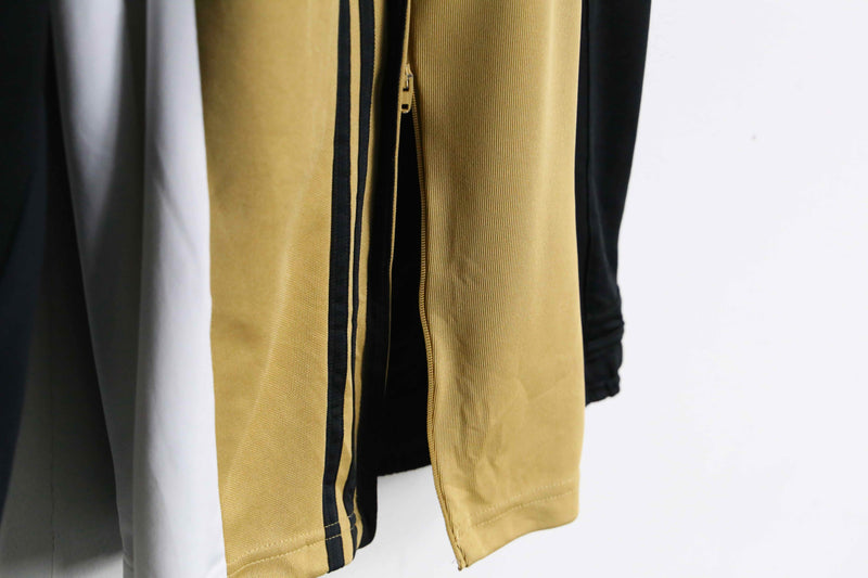 "Re:make" asymmetry patchwork HAKAMA track pants