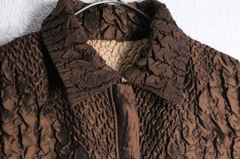 Wrinkle design reversible vest
