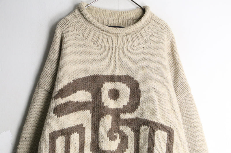 ivory boat neck design knit