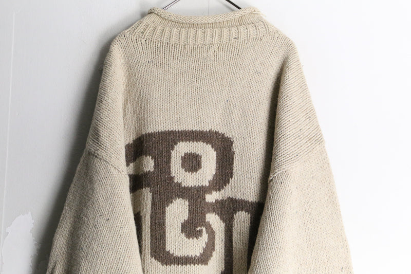 ivory boat neck design knit