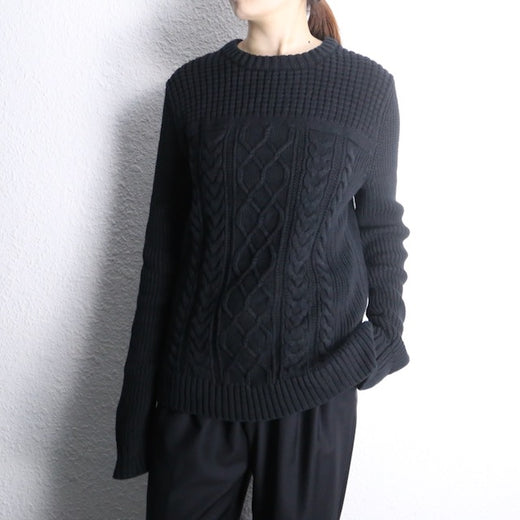 black cable knit crew neck sweater