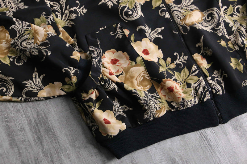 black botanical pattern zip blouson