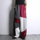 "Re:make" asymmetry docking HAKAMA track pants