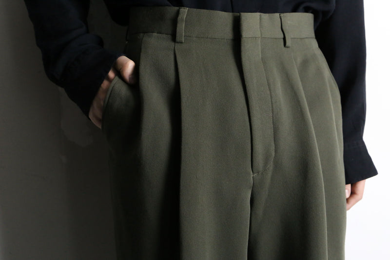 “yves saint laurent” green wide tapered trousers