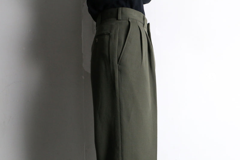 “yves saint laurent” green wide tapered trousers