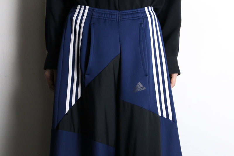 "Re:make" asymmetry patchwork HAKAMA track pants