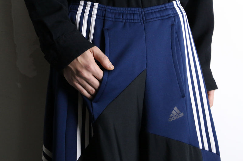 "Re:make" asymmetry patchwork HAKAMA track pants