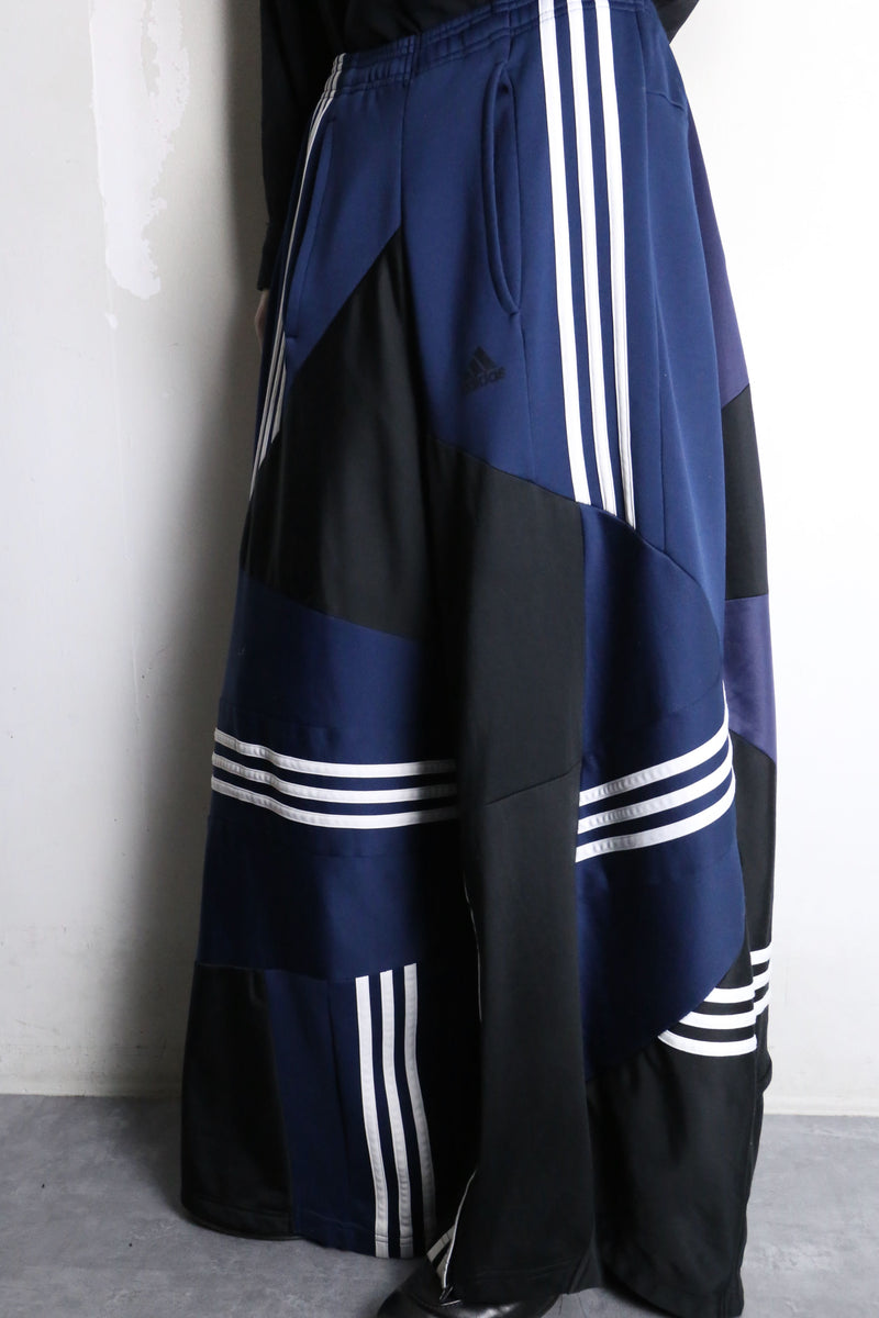 "Re:make" asymmetry patchwork HAKAMA track pants