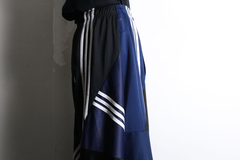 "Re:make" asymmetry patchwork HAKAMA track pants