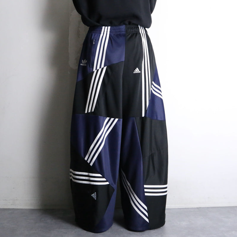 "Re:make" asymmetry patchwork HAKAMA track pants