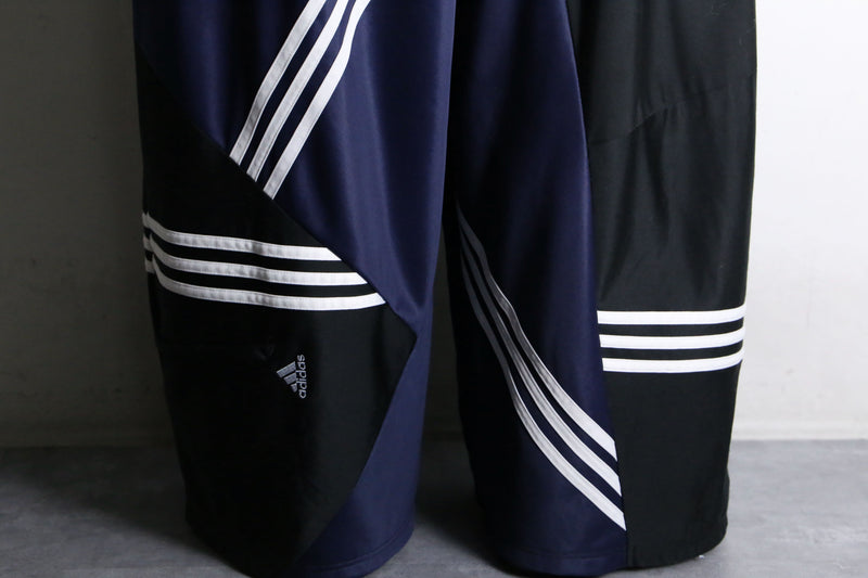 "Re:make" asymmetry patchwork HAKAMA track pants