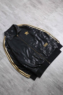 “adidas CHILE62” gold line shiny track jacket