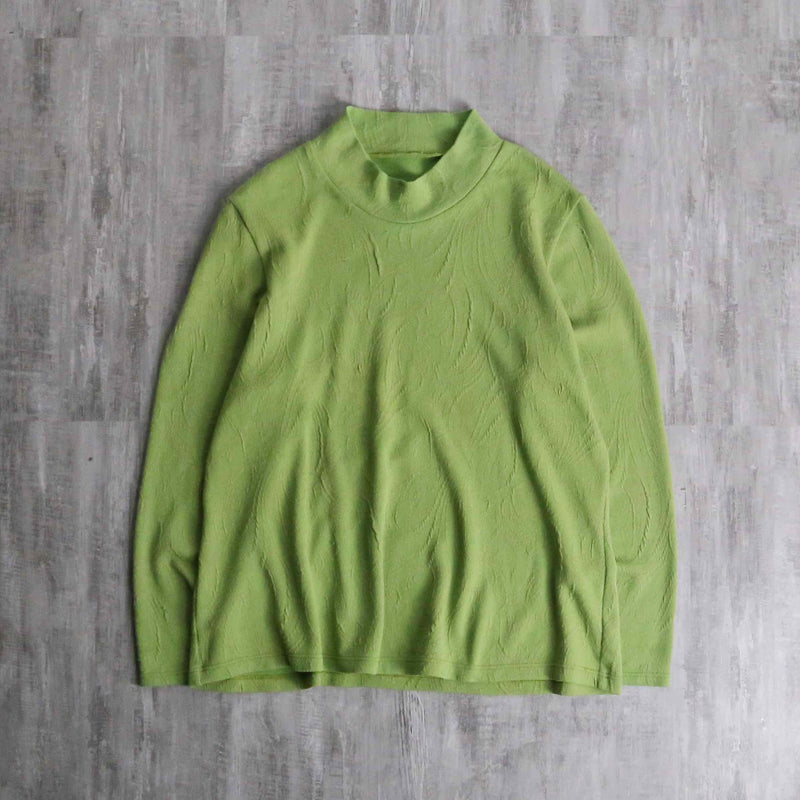 green botanical like wrinkled off neck knit