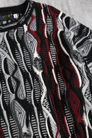 “COOGI” dark color 3D design knit