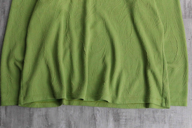 green botanical like wrinkled off neck knit