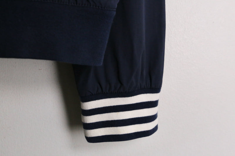 “FRED PERRY” navy nylon track jacket