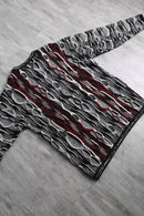 “COOGI” dark color 3D design knit