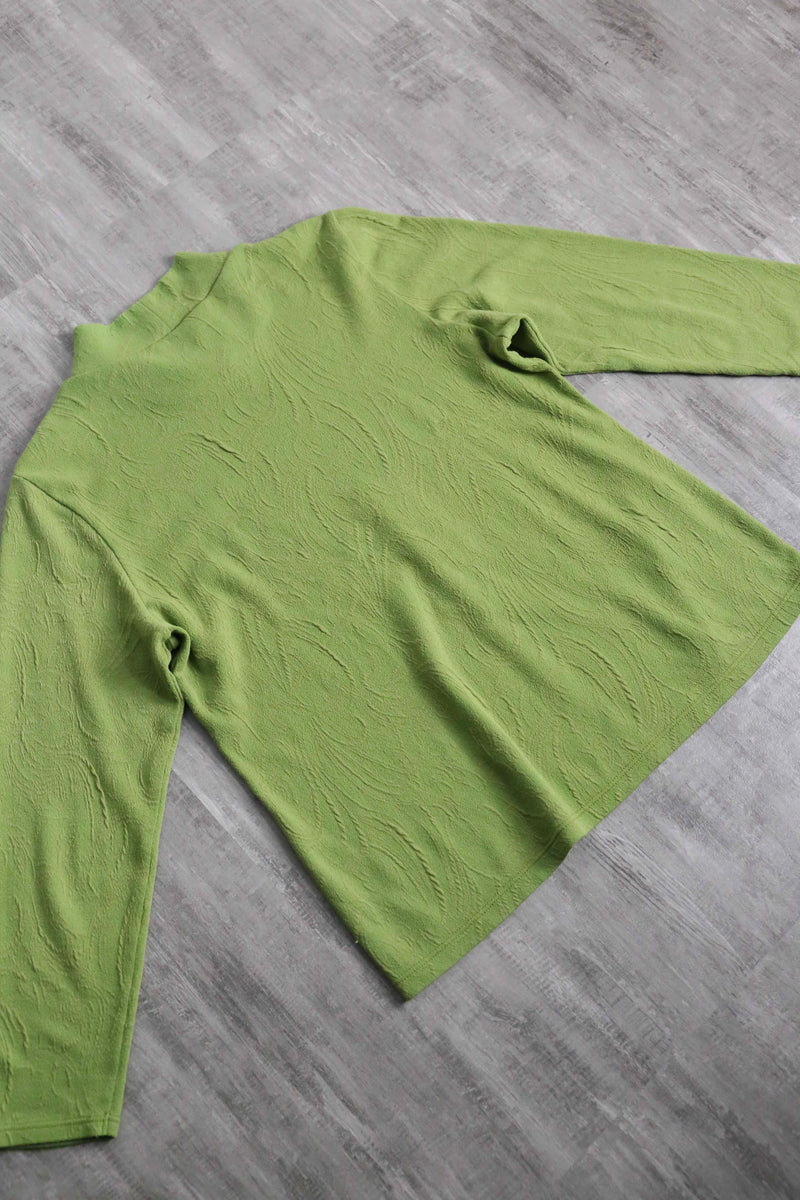 green botanical like wrinkled off neck knit