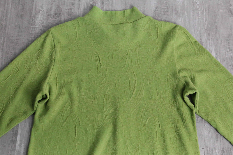 green botanical like wrinkled off neck knit