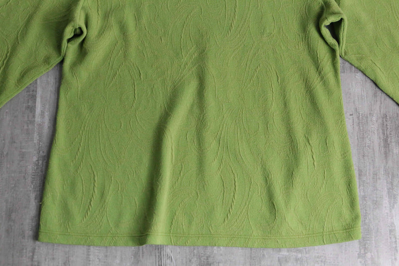 green botanical like wrinkled off neck knit