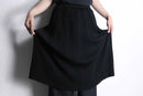 black middle length knit skirt