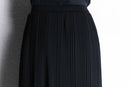 black middle length knit skirt