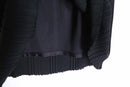 black middle length knit skirt