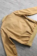 beige color design blouson