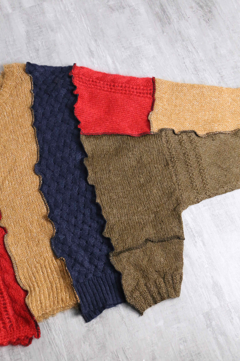 “Re:make” multi knit patchwork sweater