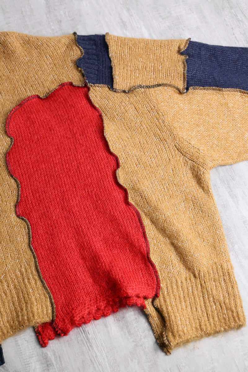 “Re:make” multi knit patchwork sweater