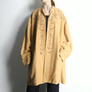 botanical embroidery over coat