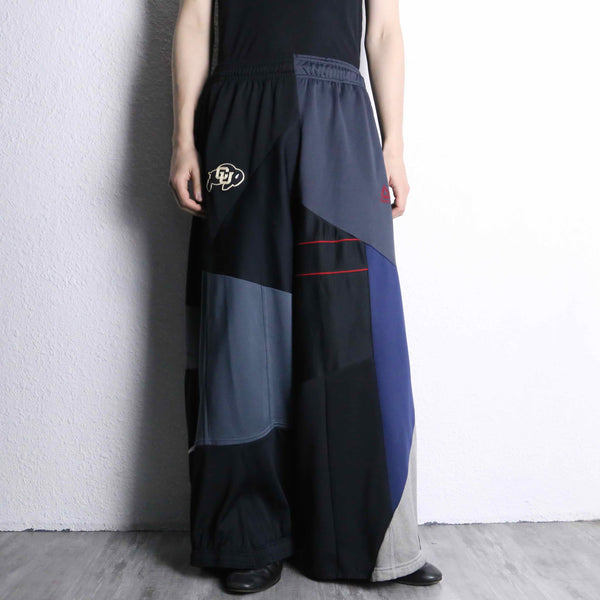 "Re:make" asymmetry patchwork design track pants