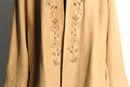 botanical embroidery over coat